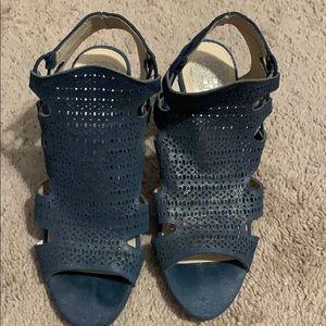 Easy slip on blue sandals.